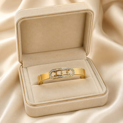 Elara Triple Crystal Oval Gold-Tone Stainless Steel Bangle