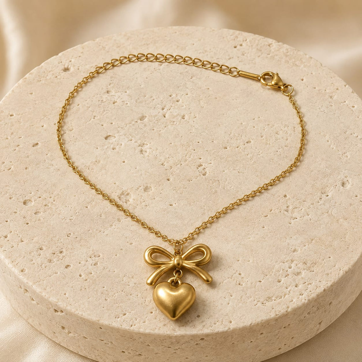 Bow Heart Charm Gold-Tone Stainless Steel Bracelet