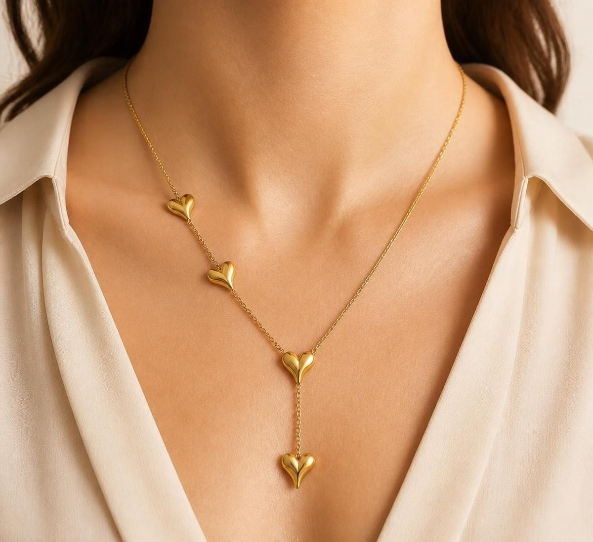 Amora Four Heart gold-tone stainless steel Y necklace for women with cascading heart drop design