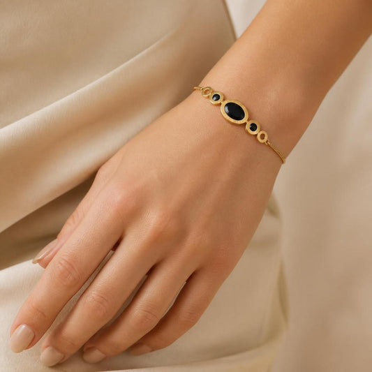Black Oval Stone Gold-Tone Stainless Steel Bangle
