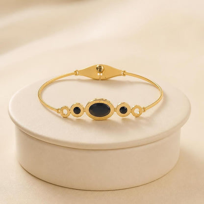 Black Oval Stone Gold-Tone Stainless Steel Bangle