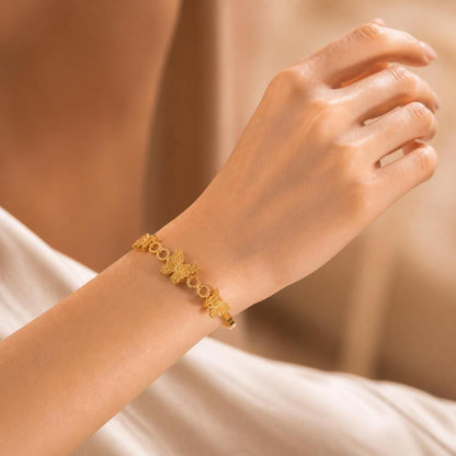 Sculpted Butterfly Link Gold-Tone Stainless Steel Bangle for Women
