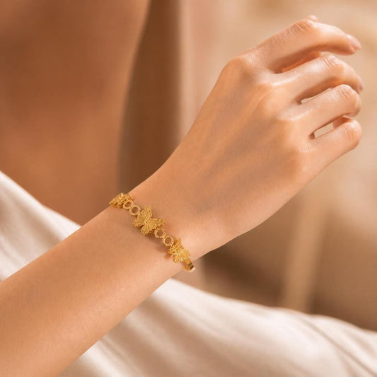Sculpted Butterfly Link Gold-Tone Stainless Steel Bangle for Women