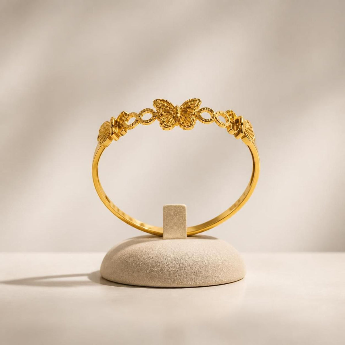 Sculpted Butterfly Link Gold-Tone Stainless Steel Bangle for Women