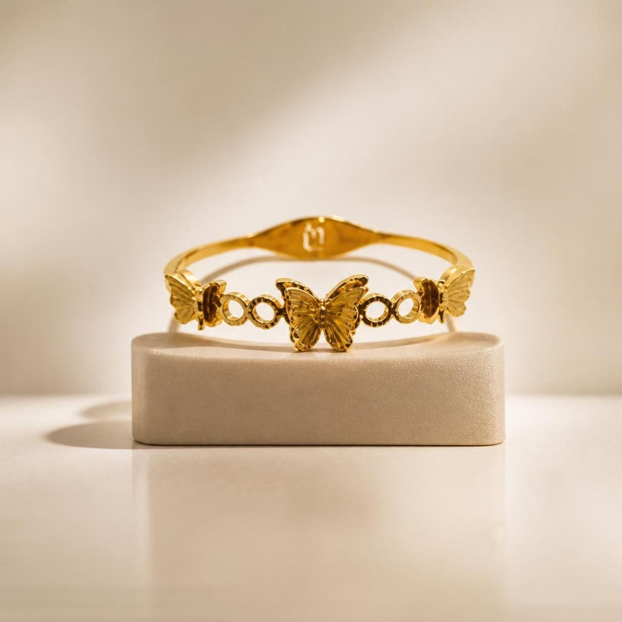 Sculpted Butterfly Link Gold-Tone Stainless Steel Bangle for Women